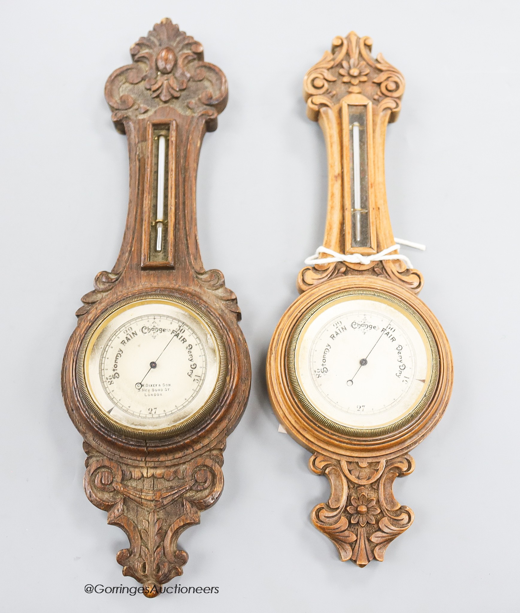 Two miniature wheel barometers, height 23cm